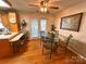 Eat-in kitchen and breakfast nook features hardwood floors and outdoor access at 115 Turner St, Lincolnton, NC 28092