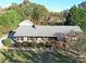 Charming single-story brick home with a well-manicured lawn and mature trees at 115 Turner St, Lincolnton, NC 28092