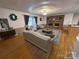 Bright living room boasts a fireplace, neutral furniture, and detailed ceiling design for an inviting space at 115 Turner St, Lincolnton, NC 28092