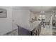 Modern kitchen island featuring granite countertops and dark wood cabinetry with open living space at 2507 Andes Dr, Statesville, NC 28625