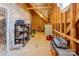 Unfinished basement space with exposed beams and storage shelves at 3848 Zemosa Nw Ln, Concord, NC 28027
