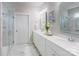 A well-lit bathroom with a double vanity and a glass-enclosed shower at 3848 Zemosa Nw Ln, Concord, NC 28027