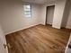 Basement bedroom with wood-look floors and a closet at 912 Surry Dr, Shelby, NC 28152