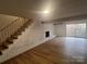 Finished basement with a fireplace, walkout access, and neutral flooring at 912 Surry Dr, Shelby, NC 28152