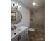Modern bathroom with updated vanity, fixtures, and a shower at 912 Surry Dr, Shelby, NC 28152