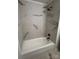 Updated bathroom with marble tile and new bathtub at 912 Surry Dr, Shelby, NC 28152