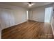 Bright bedroom with wood-look floors and double closets at 912 Surry Dr, Shelby, NC 28152