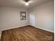 Spacious bedroom featuring wood-look floors and a large closet at 912 Surry Dr, Shelby, NC 28152