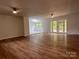 Expansive living room with hardwood floors connects multiple gathering spaces at 912 Surry Dr, Shelby, NC 28152