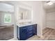 Bathroom featuring a double sink vanity with modern fixtures at 107 Monterey Dr, Mooresville, NC 28117