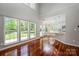 An open-concept living room features hardwood floors, natural light, and kitchen views at 107 Monterey Dr, Mooresville, NC 28117