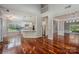 Hardwood floors highlight an open layout between the living room, dining area, and kitchen at 107 Monterey Dr, Mooresville, NC 28117