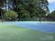 Well-maintained tennis court and basketball court, perfect for enjoying a game in the community at 107 Monterey Dr, Mooresville, NC 28117