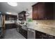 Well-equipped kitchen with granite counters, stainless steel appliances, and stylish tile backsplash at 3092 Lee Lawing Rd, Lincolnton, NC 28092