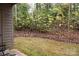 Small backyard with trees and grassy area at 4130 Charlotte Hwy # G, Lake Wylie, SC 29710