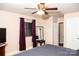 Main bedroom with large mirror and ceiling fan at 4130 Charlotte Hwy # G, Lake Wylie, SC 29710