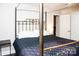 Spacious bedroom with a large metal bed frame at 4130 Charlotte Hwy # G, Lake Wylie, SC 29710