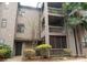 Building exterior showcasing multiple balconies and landscaping at 4130 Charlotte Hwy # G, Lake Wylie, SC 29710