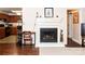 Living room with a fireplace and kitchen view at 4130 Charlotte Hwy # G, Lake Wylie, SC 29710
