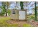 Wooden storage shed with a single window and door at 4401 Trace Ave, Gastonia, NC 28056