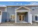 Rear view showing the patio, the home's siding, and backyard area with new construction at 6259 Tea Olive Dr # 178, Harrisburg, NC 28075