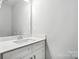 Well-lit bathroom showcasing a modern vanity, sleek fixtures, and a clean, minimalist design at 6259 Tea Olive Dr # 178, Harrisburg, NC 28075