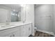 Modern bathroom featuring a double vanity, granite counters, and stylish fixtures at 6259 Tea Olive Dr # 178, Harrisburg, NC 28075