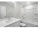 Bathroom featuring a tub and shower combination, a vanity and commode at 6259 Tea Olive Dr # 178, Harrisburg, NC 28075