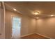 Bright, carpeted bedroom with recessed lighting and a view of the neighborhood at 6259 Tea Olive Dr # 178, Harrisburg, NC 28075