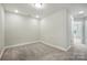Comfortable bedroom featuring soft carpet, recessed lighting, and an open doorway at 6259 Tea Olive Dr # 178, Harrisburg, NC 28075