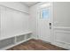 Bright entryway featuring coat hooks, storage bench, and natural light at 6259 Tea Olive Dr # 178, Harrisburg, NC 28075