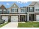 Charming townhome with stone accents, a one car garage, and craftsman style architecture at 6259 Tea Olive Dr # 178, Harrisburg, NC 28075
