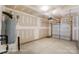 A two car garage with concrete floor, overhead door, and ready for your vehicles at 6259 Tea Olive Dr # 178, Harrisburg, NC 28075