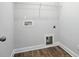 Laundry room including hookups and space for washer and dryer, wire shelving, and vinyl flooring at 6259 Tea Olive Dr # 178, Harrisburg, NC 28075