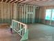 Unfinished basement with exposed framing and concrete flooring at 1029 Wandsworth Pl # Ken0105, Charlotte, NC 28215