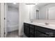 Shared bathroom with a double vanity, tub, and shower at 1029 Wandsworth Pl # Ken0105, Charlotte, NC 28215