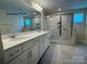 Double vanity bathroom with large walk in shower at 1029 Wandsworth Pl # Ken0105, Charlotte, NC 28215