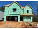 New house under construction, showing exterior framing and house wrap at 1029 Wandsworth Pl # Ken0105, Charlotte, NC 28215