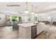 Open concept kitchen with island and modern appliances at 1029 Wandsworth Pl # Ken0105, Charlotte, NC 28215