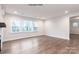 Bright and spacious living area with hardwood floors at 1029 Wandsworth Pl # Ken0105, Charlotte, NC 28215