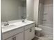 Bathroom with double vanity, soaking tub, and shower at 106 Obadiah Ct, Troutman, NC 28115