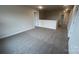 Loft bedroom with plush gray carpet and an open layout at 106 Obadiah Ct, Troutman, NC 28115