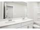 Bathroom features a double sink vanity and large mirror, offering plenty of space at 122 Satchel Ct, Troutman, NC 28115