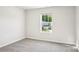 Neutral bedroom with a view out of the window at 122 Satchel Ct, Troutman, NC 28115