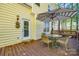 Back deck with umbrella, table and chairs, and seating on the back of the house at 3195 Hadden Hall Blvd, Fort Mill, SC 29715