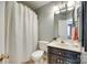 This bathroom features a shower with curtain, a vanity and a toilet at 3195 Hadden Hall Blvd, Fort Mill, SC 29715