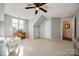 A bedroom features neutral carpet, two closets, and ample natural light from windows at 3195 Hadden Hall Blvd, Fort Mill, SC 29715