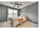 Bedroom features neutral color scheme, comfortable bed, and cozy atmosphere at 3195 Hadden Hall Blvd, Fort Mill, SC 29715