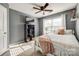 Bedroom with neutral carpet, a window, ceiling fan, and modern furnishings at 3195 Hadden Hall Blvd, Fort Mill, SC 29715