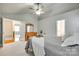 Comfortable main bedroom with a soft gray quilt, light carpet, and ample natural light at 3195 Hadden Hall Blvd, Fort Mill, SC 29715